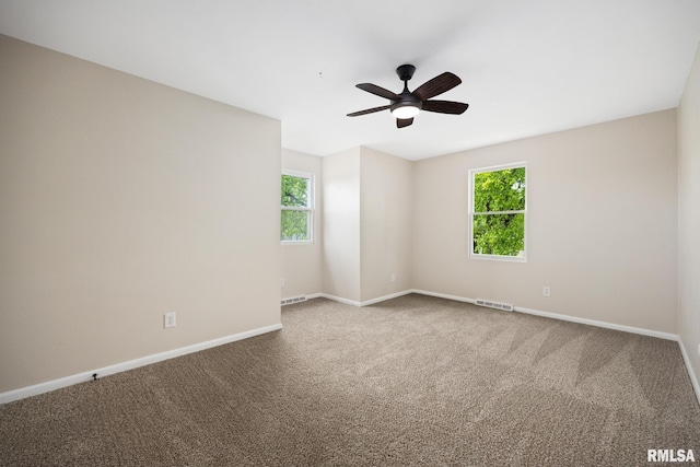3348 W Lisa Ln, Peoria, IL 61615 - carpeted empty room with a ceiling fan and baseboards