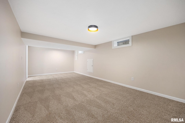 3348 W Lisa Ln, Peoria, IL 61615 - below grade area featuring carpet and baseboards