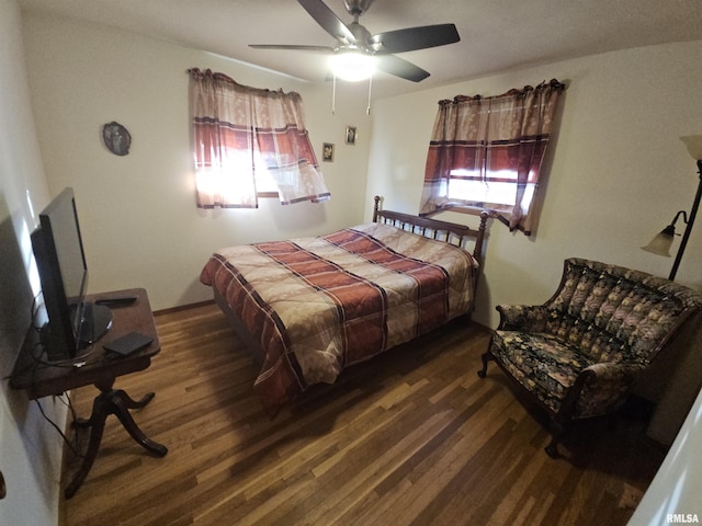 3303 W Chartwell Rd, Peoria, IL 61614 - bedroom with multiple windows, wood finished floors, and ceiling fan