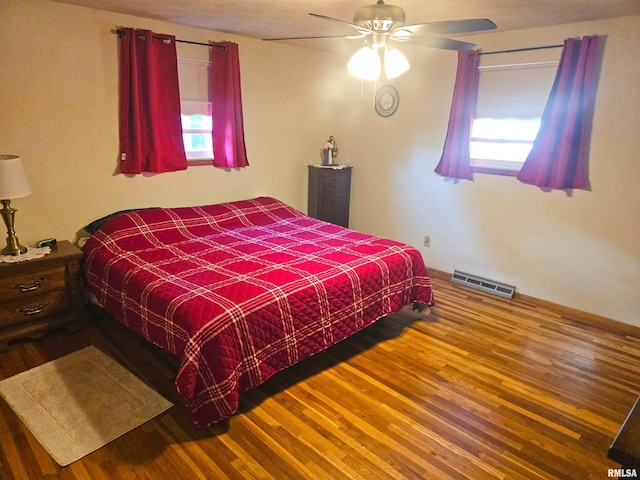 3303 W Chartwell Rd, Peoria, IL 61614 - bedroom with wood finished floors and a ceiling fan