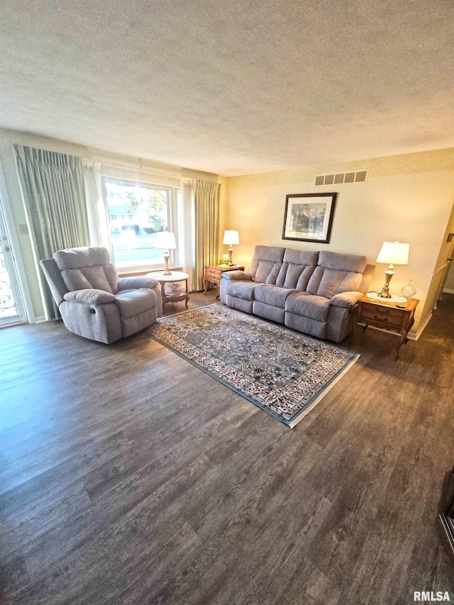 3303 W Chartwell Rd, Peoria, IL 61614 - living room with a textured ceiling and wood finished floors