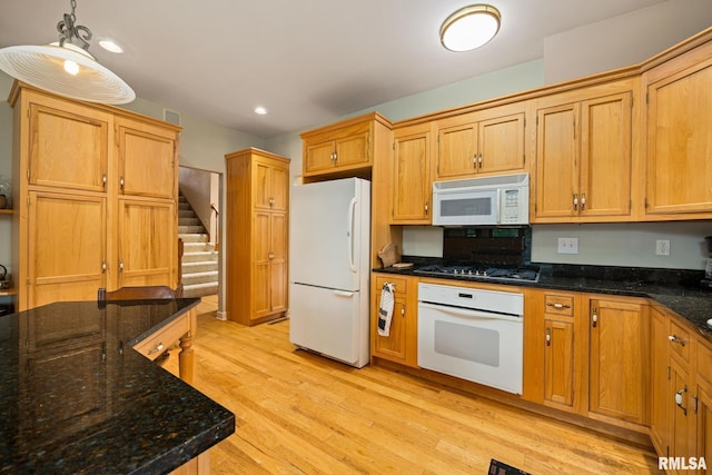131 Lakeside Pl, Dahinda, IL 61428 - kitchen featuring white appliances, light wood finished floors, decorative light fixtures, dark stone countertops, and recessed lighting