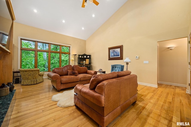 131 Lakeside Pl, Dahinda, IL 61428 - living room with high vaulted ceiling, ceiling fan, light wood finished floors, recessed lighting, and baseboards