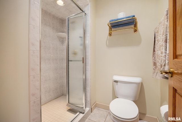 131 Lakeside Pl, Dahinda, IL 61428 - full bath with toilet, a stall shower, tile patterned flooring, and baseboards