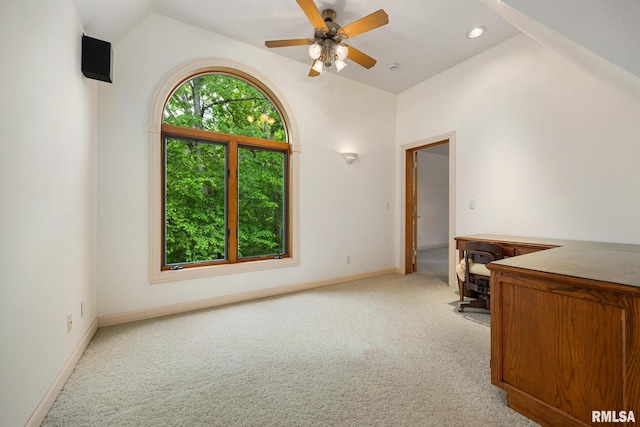 131 Lakeside Pl, Dahinda, IL 61428 - empty room with light carpet, vaulted ceiling, ceiling fan, and baseboards