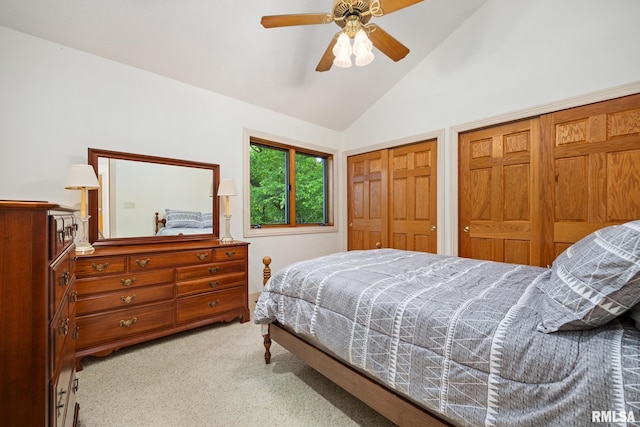 131 Lakeside Pl, Dahinda, IL 61428 - bedroom featuring carpet flooring, two closets, ceiling fan, and high vaulted ceiling