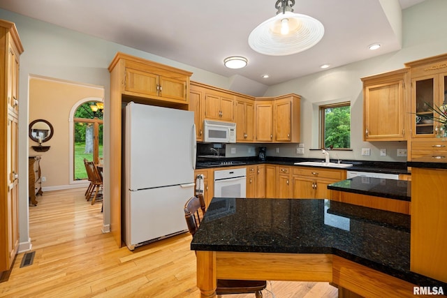 131 Lakeside Pl, Dahinda, IL 61428 - kitchen featuring white appliances, a sink, light wood finished floors, hanging light fixtures, and recessed lighting