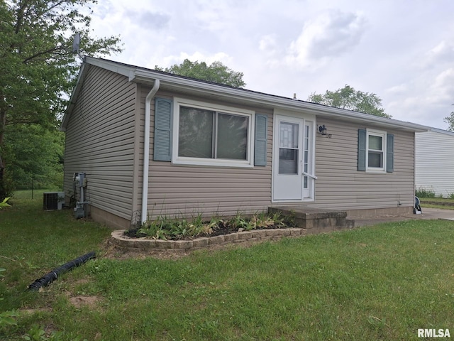 1907 Chicory Rd, Pekin, IL 61554 - view of front of house with a front yard and central air condition unit