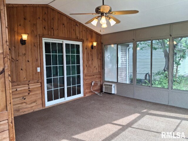 1907 Chicory Rd, Pekin, IL 61554 - unfurnished sunroom featuring vaulted ceiling, a ceiling fan, and a wall unit AC