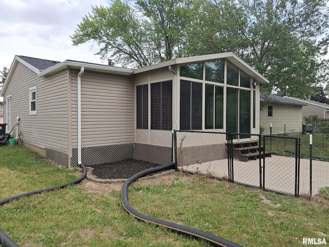 1907 Chicory Rd, Pekin, IL 61554 - view of home's exterior featuring a sunroom