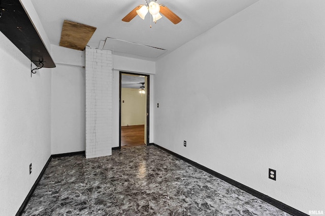507 E Main St, Bryant, IL 61519 - unfurnished bedroom featuring attic access, baseboards, and ceiling fan