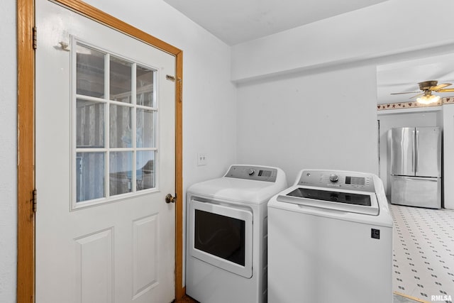 507 E Main St, Bryant, IL 61519 - laundry room featuring independent washer and dryer and a ceiling fan