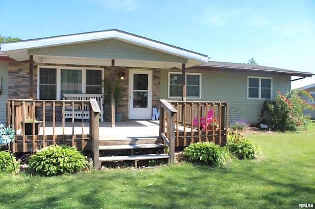 16338 E Red Maple Ln, Lewistown, IL 61542 - rear view of property with a yard and a deck