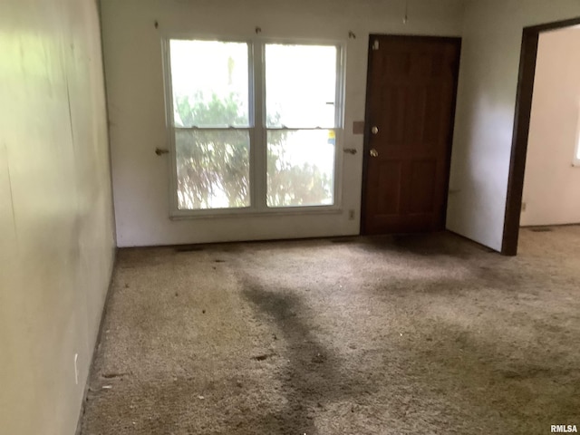 1908 N Idaho St, Peoria, IL 61604 - spare room with healthy amount of natural light and carpet flooring