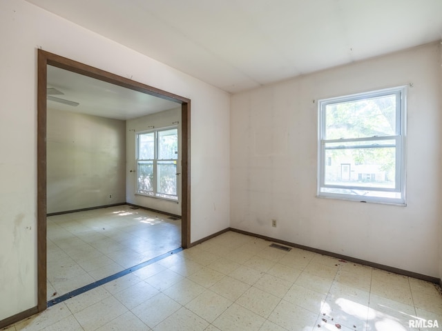 1908 N Idaho St, Peoria, IL 61604 - unfurnished room featuring baseboards and light flooring