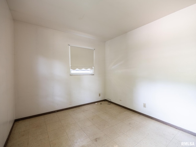1908 N Idaho St, Peoria, IL 61604 - spare room featuring light floors and baseboards