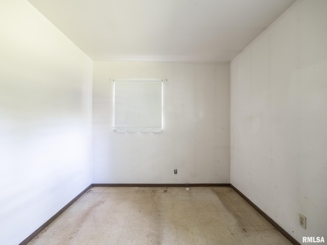 1908 N Idaho St, Peoria, IL 61604 - spare room featuring light flooring and baseboards