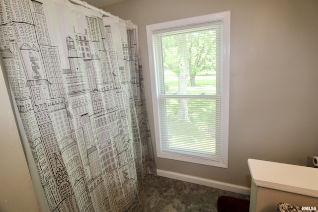 14701 N Old Galena Rd, Chillicothe, IL 61523 - bathroom with plenty of natural light, baseboards, vanity, and a shower with curtain