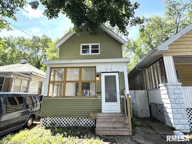 410 E Thrush Ave, Peoria, IL 61603 - rear view of house featuring entry steps