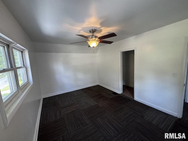 410 E Thrush Ave, Peoria, IL 61603 - spare room with baseboards and a ceiling fan