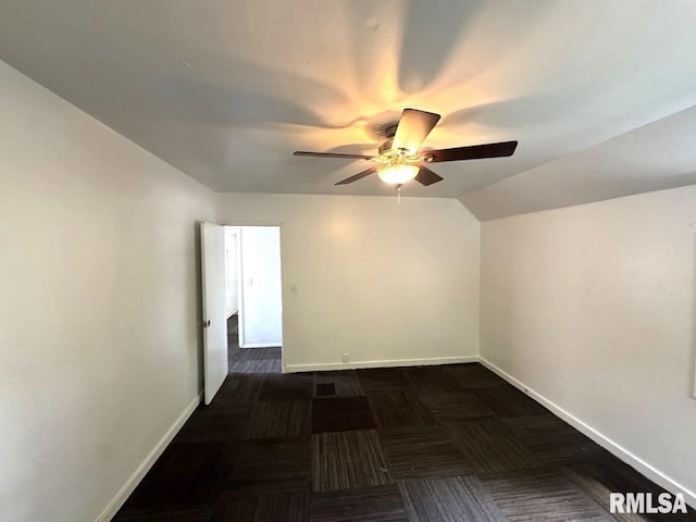 410 E Thrush Ave, Peoria, IL 61603 - empty room featuring ceiling fan, baseboards, and dark carpet