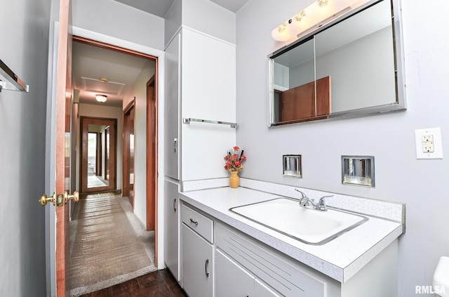 1202 W Purtscher Dr, Peoria, IL 61614 - bathroom featuring vanity and wood finished floors