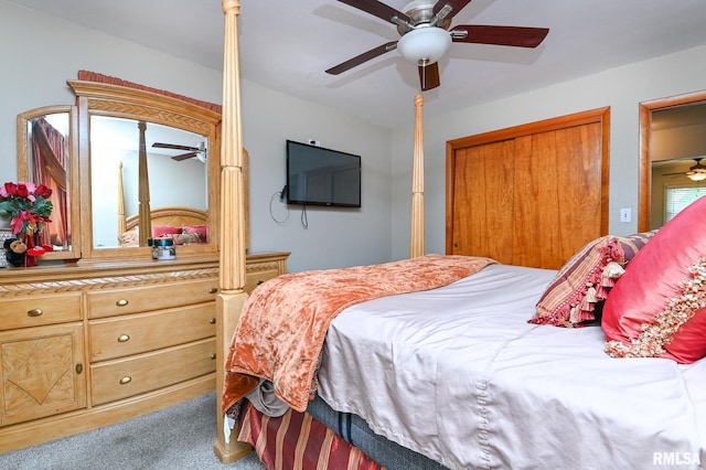 1202 W Purtscher Dr, Peoria, IL 61614 - carpeted bedroom with a closet and a ceiling fan