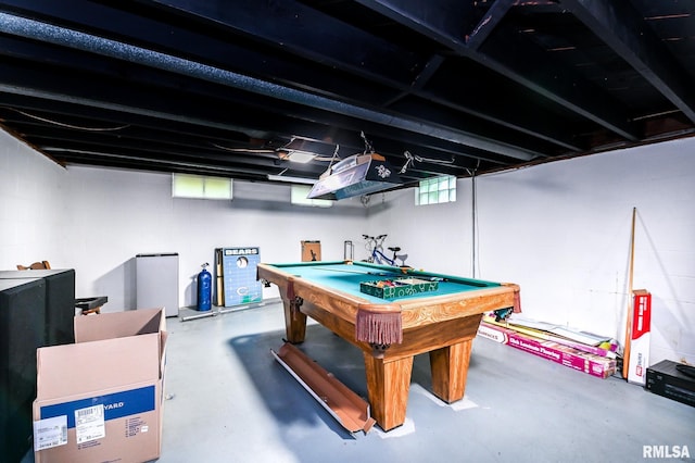 1202 W Purtscher Dr, Peoria, IL 61614 - playroom featuring concrete flooring and pool table