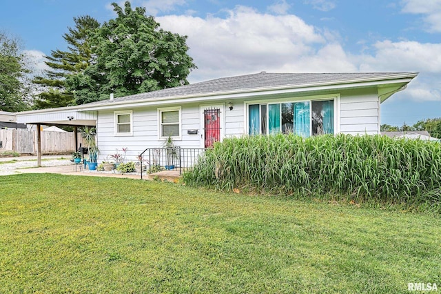 1202 W Purtscher Dr, Peoria, IL 61614 - ranch-style home featuring a carport