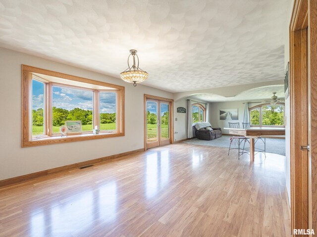 26620 Schuck Rd, Washington, IL 61571 - spare room featuring healthy amount of natural light, baseboards, and light wood-type flooring