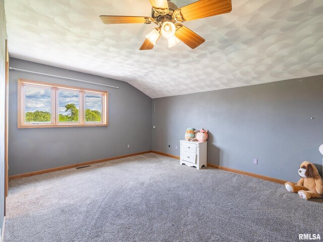26620 Schuck Rd, Washington, IL 61571 - bonus room featuring vaulted ceiling, carpet flooring, baseboards, and ceiling fan