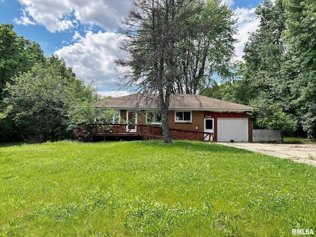9333 S Powell Rd, Peoria, IL 61607 - single story home featuring a garage, a front lawn, driveway, and a deck