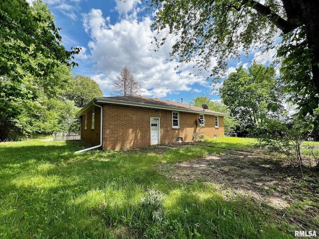 9333 S Powell Rd, Peoria, IL 61607 - rear view of house with brick siding