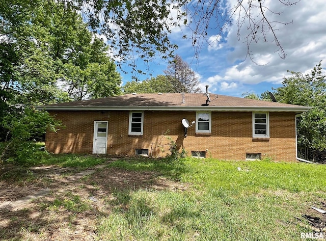 9333 S Powell Rd, Peoria, IL 61607 - rear view of house with brick siding