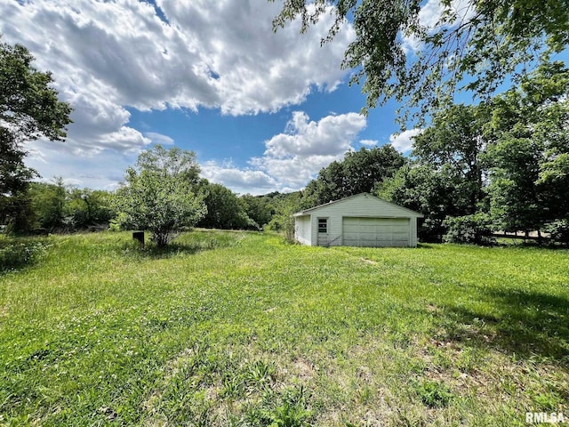 9333 S Powell Rd, Peoria, IL 61607 - view of yard with a detached garage and an outdoor structure