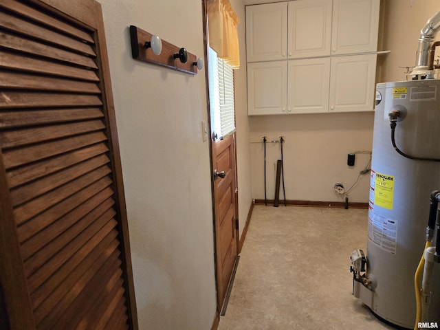 407 N 12th Ave, Canton, IL 61520 - washroom with water heater and cabinet space