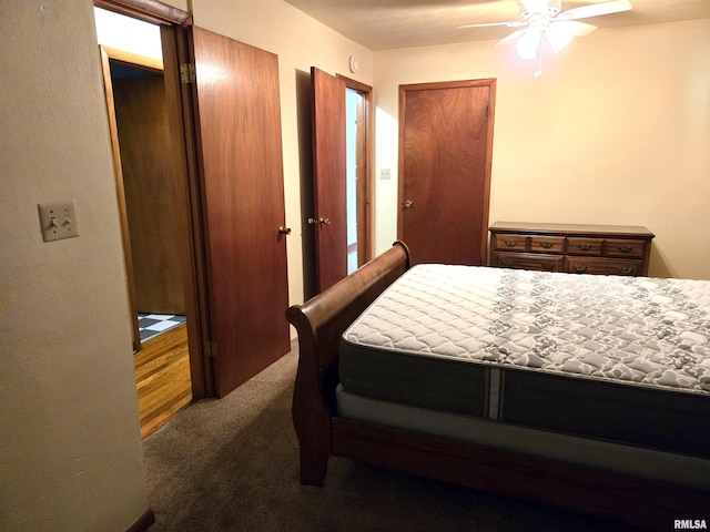 407 N 12th Ave, Canton, IL 61520 - carpeted bedroom featuring a ceiling fan