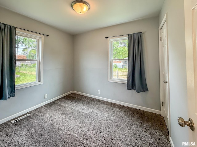 311 N 5th St, Chillicothe, IL 61523 - empty room featuring carpet flooring and baseboards