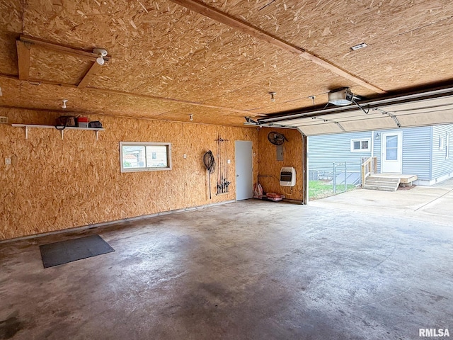 311 N 5th St, Chillicothe, IL 61523 - garage with heating unit and a garage door opener
