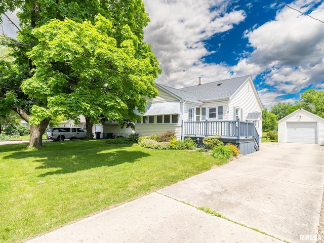 110 Loren St, Washington, IL 61571 - view of front of home with an outbuilding, a detached garage, driveway, a wooden deck, and a front lawn
