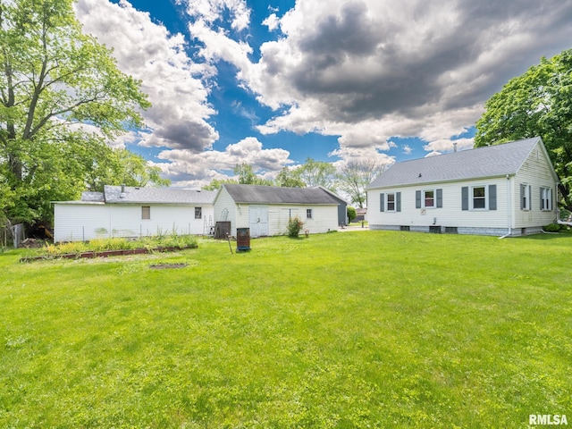 110 Loren St, Washington, IL 61571 - view of green lawn featuring an outbuilding