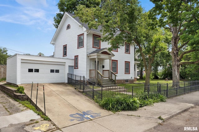 1006 N Maplewood Ave, Peoria, IL 61606 - view of front of home with a fenced front yard and a detached garage
