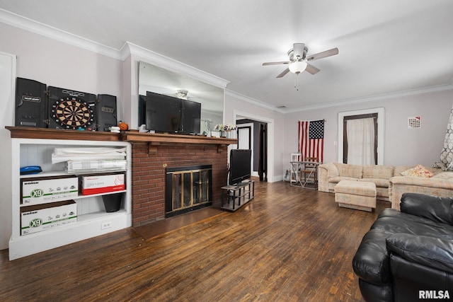 1006 N Maplewood Ave, Peoria, IL 61606 - living area with ceiling fan, a brick fireplace, wood finished floors, and ornamental molding