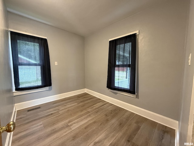 210 Minch St, South Pekin, IL 61564 - empty room with wood finished floors and baseboards