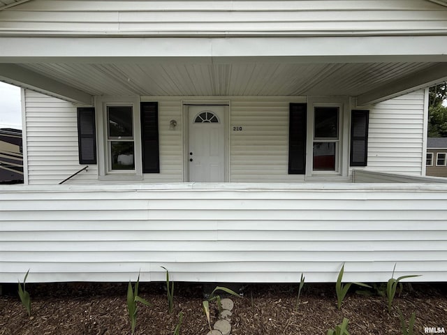 210 Minch St, South Pekin, IL 61564 - property entrance featuring a porch