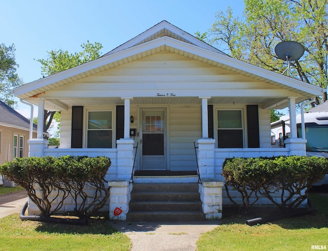 1204 W Virginia Ave, Peoria, IL 61604 - view of front facade featuring covered porch