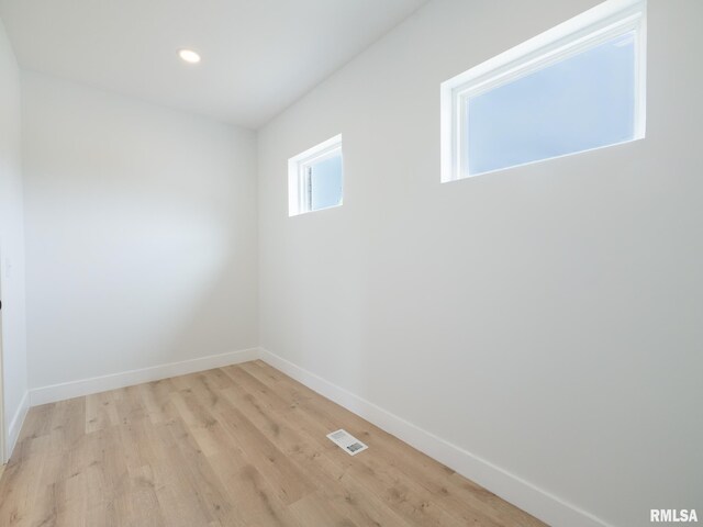 112 Shannon Hills Dr, Washington, IL 61571 - empty room with light wood-style flooring, baseboards, and recessed lighting