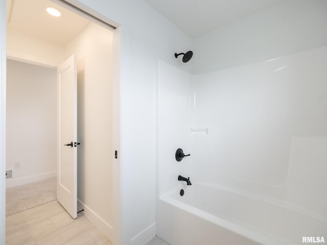 112 Shannon Hills Dr, Washington, IL 61571 - bathroom with shower / tub combination and baseboards