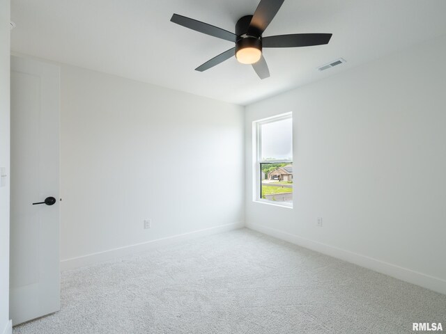 112 Shannon Hills Dr, Washington, IL 61571 - carpeted empty room featuring a ceiling fan and baseboards