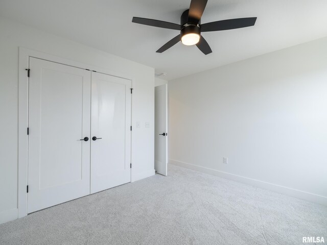 112 Shannon Hills Dr, Washington, IL 61571 - unfurnished bedroom featuring carpet floors, a closet, a ceiling fan, and baseboards